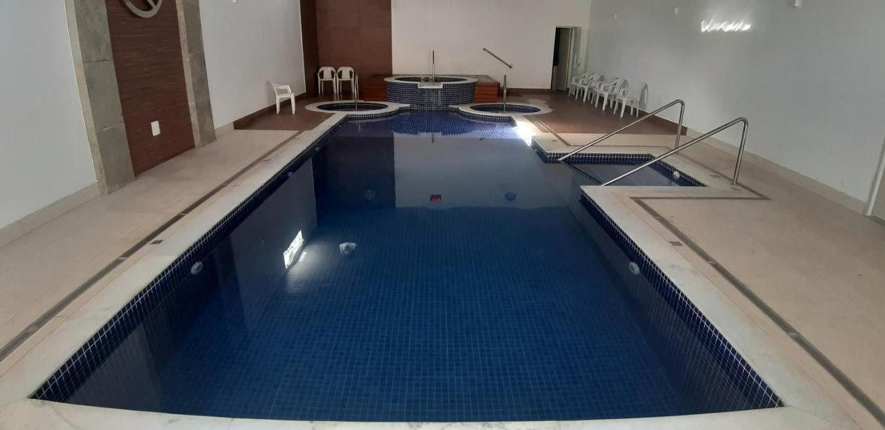 Flat No Apart-Hotel Cavalinho Branco Com Piscina Aquecida 1D8 อากวัสจิลิงดอยา ภายนอก รูปภาพ